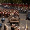 Truppen der Länder der Koalition der Willigen führten die Militärparade zum französischen Nationalfeiertag an.